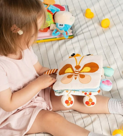 Książeczka sensoryczna Kroki dla niemowląt miękka kontrastowa szeleszcząca