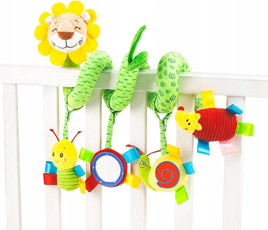 Colourful activity spiral with a lion and a mirror attached to cot bars