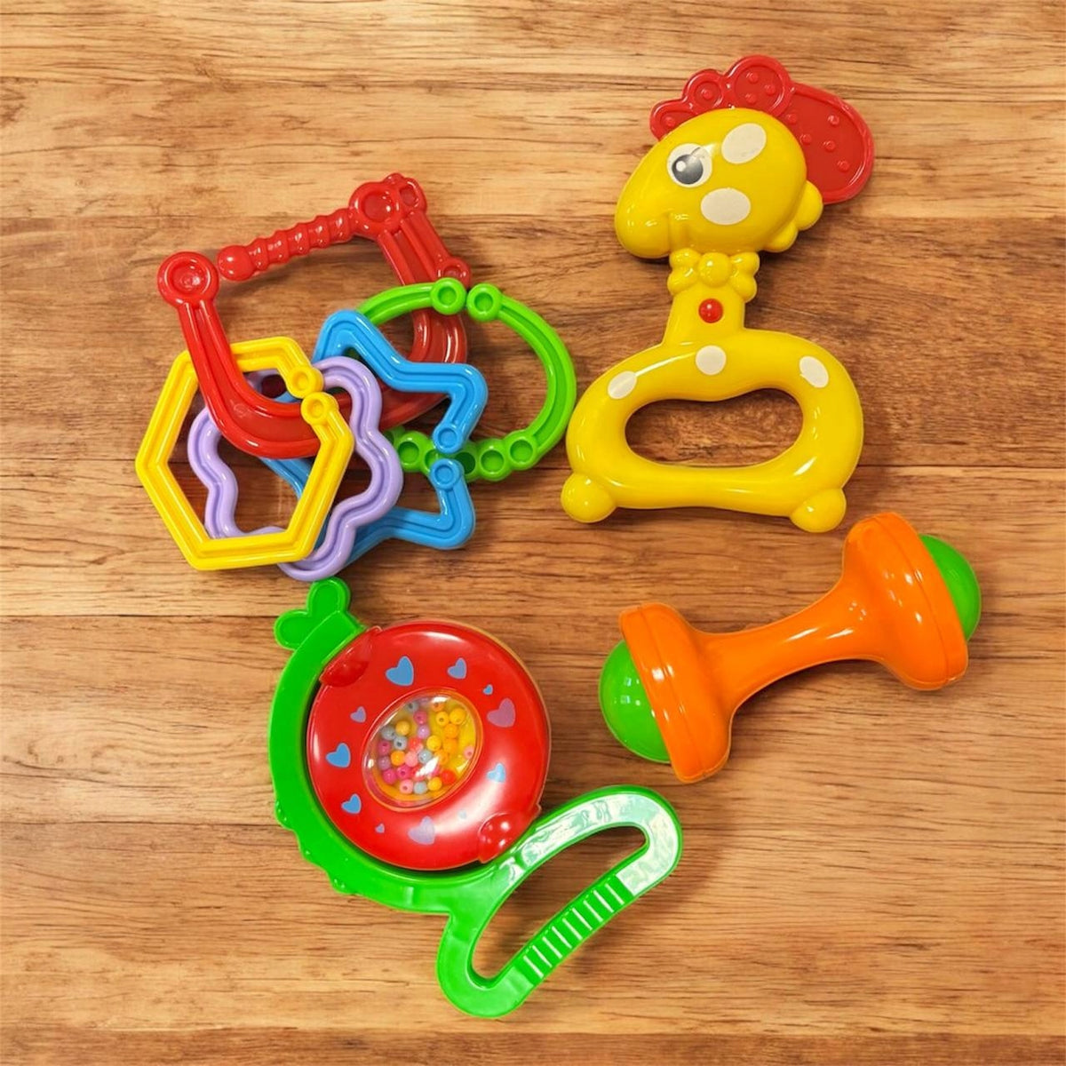Set aus bunten Rasseln und Beißringen Baby Star – Foto 4