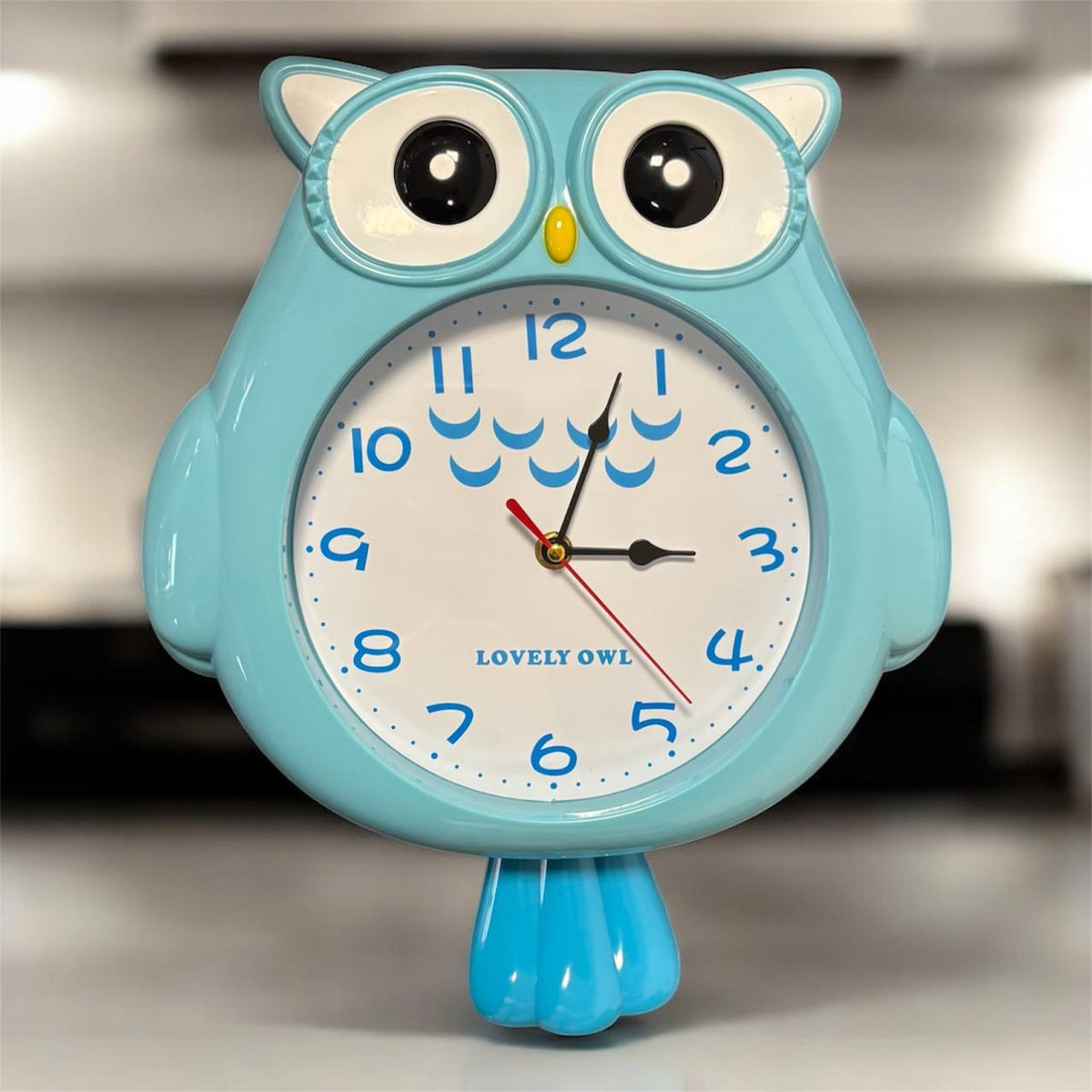 Blaue Wanduhr in Eulenform für das Kinderzimmer – Foto 3
