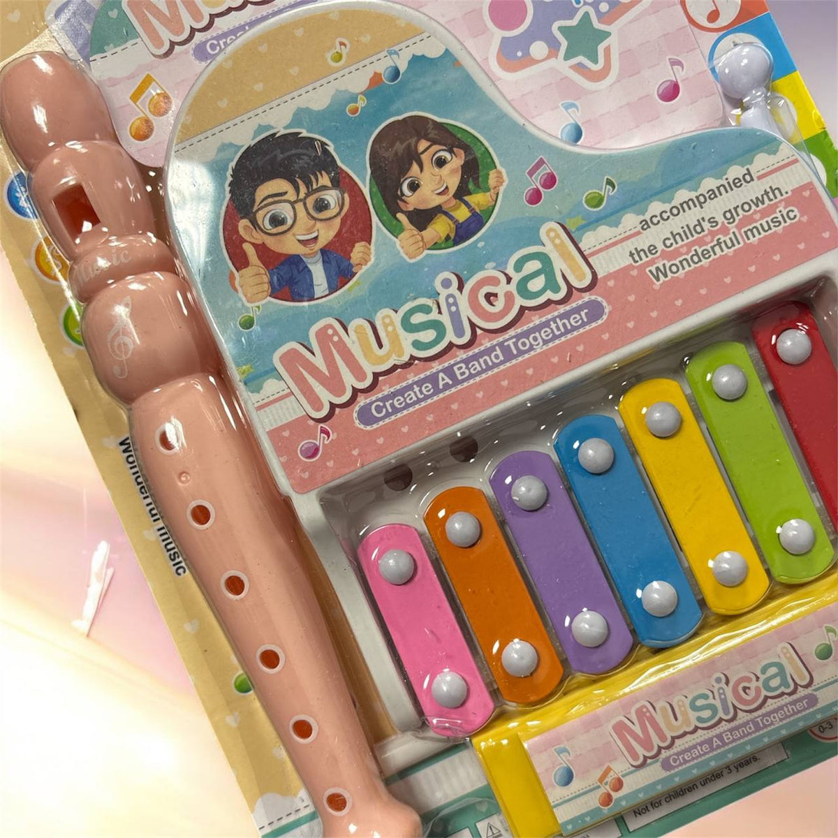 Pastelowy zestaw muzyczny dla dzieci – cymbałki, flet i harmonijka – zdjęcie 2