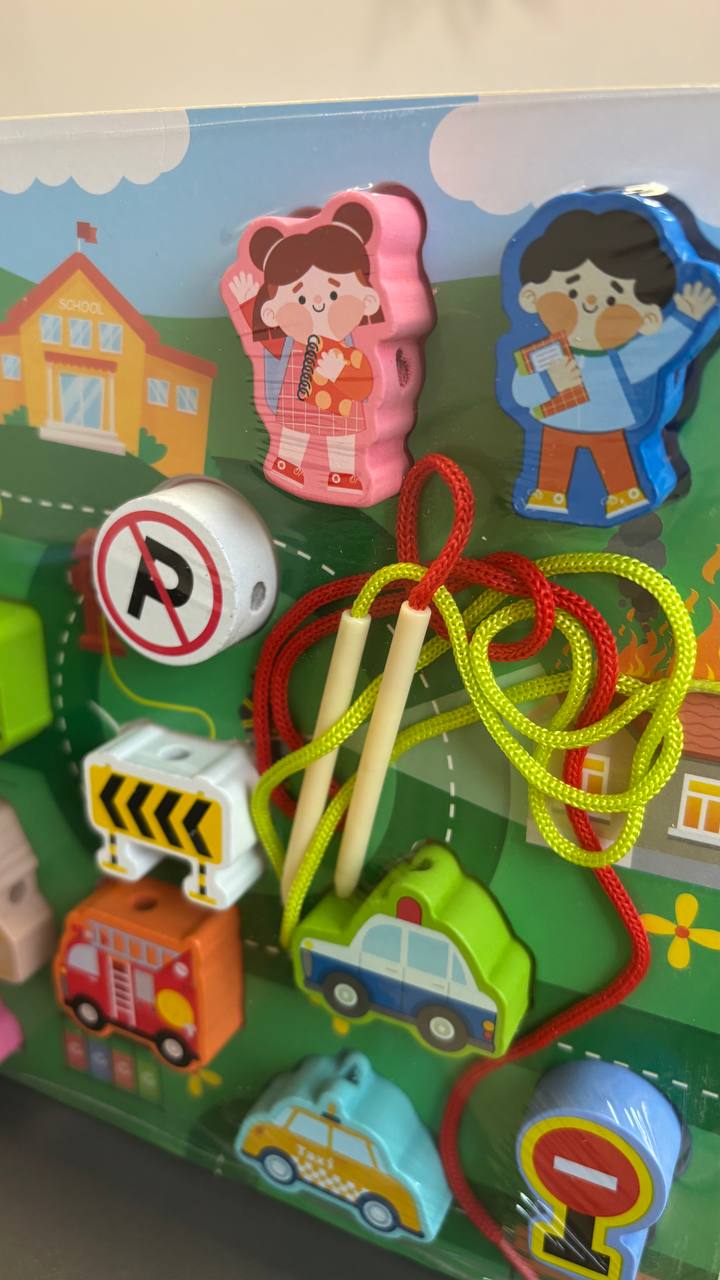 Wooden lacing toy with vehicles and a city-themed board – photo 2